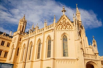 Lednice, Southern Moravia, Czech Republic, 04 July 2021: chateau with beautiful gardens, flower parks on sunny summer day, neo-gothic romantic castle, UNESCO World Heritage, Lednice Valtice Landscape