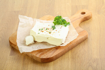 Greek Feta cheese over board