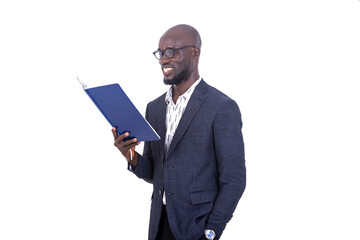 adult businessman reading a document while smiling.