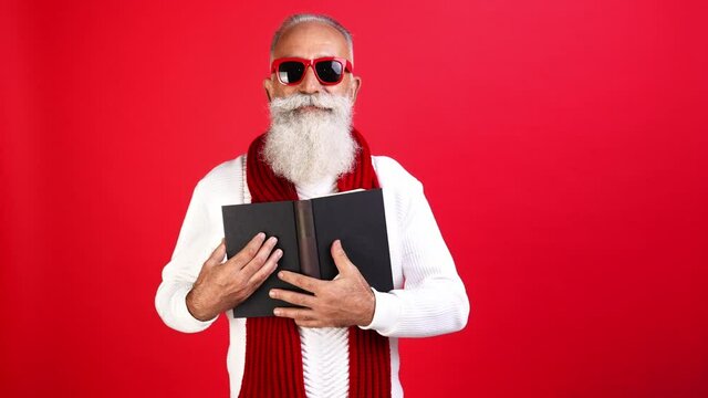 Clever santa claus read fairy tail story x-mas carol embrace textbook