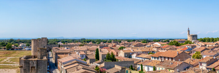 Aigues-Mortes medieval town red tailed rooftops, in the Gard department in the Occitanie region of southern France