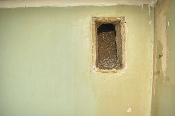 old air ventilation on the wall in the kitchen