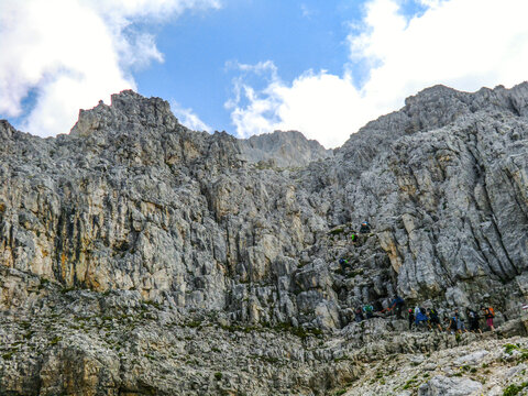 Rosengarten also called Catinaccio mountain range in the Dolomites of South Tyrol (Alto Adige) during autumn. The Vajolet Towers and the rock face of mount Laurin Wand. The Rosengarten is part of the 