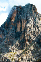 Rosengarten also called Catinaccio mountain range in the Dolomites of South Tyrol (Alto Adige) during autumn. The Vajolet Towers and the rock face of mount Laurin Wand. The Rosengarten is part of the 