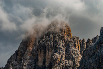 Rosengarten also called Catinaccio mountain range in the Dolomites of South Tyrol (Alto Adige) during autumn. The Vajolet Towers and the rock face of mount Laurin Wand. The Rosengarten is part of the 