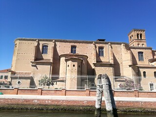 Fototapeta na wymiar Mooring post near San Domenico Church in Chioggia, Venice, Italy