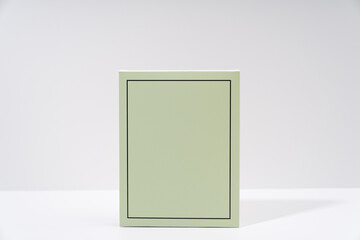 green paper with frame