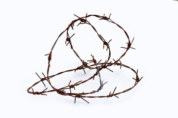 Rusty barb wire isolated on white background