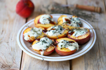Baked peaches with dor blue cheese. Healthy food. The keto diet. Vegetarian snack.