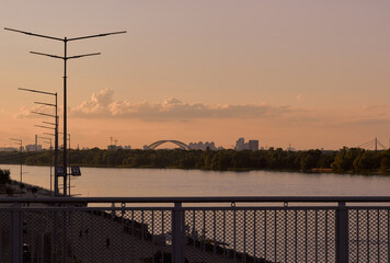 Fototapeta na wymiar Landscape of Kyiv city and Dnipro river. Evening time. 