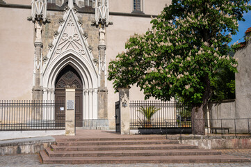 Fototapeta na wymiar Entrance of the church of Admont on a sunny day in springtime