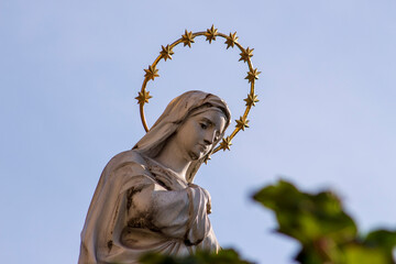 Monument to the Mother of God with a halo in the park