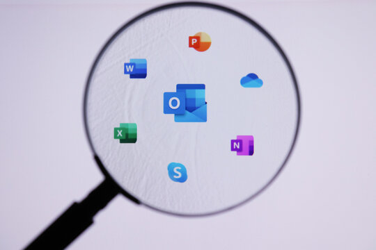 Microsoft website on a computer screen under a magnifying glass  - Chiang Mai, Thailand September 28, 2021