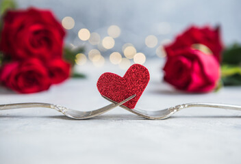 Forks and a heart. Holiday menu for Valentines Day.