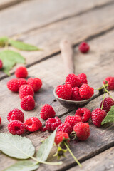 Fresh and sweet red raspberries.  fruit pile background. Macro Photo food raspberry.