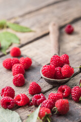 Fresh and sweet red raspberries.  fruit pile background. Macro Photo food raspberry.