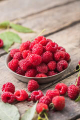 Fresh and sweet red raspberries.  fruit pile background. Macro Photo food raspberry.