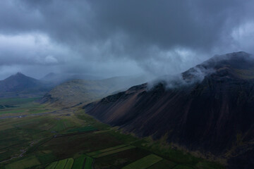 Iceland mountains cover in fog aerail view