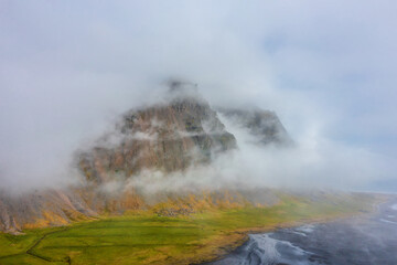 Aerial view on Vestrahorn covered in cloud