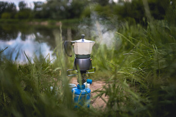 Making Coffee on Camping Gas in Nature
