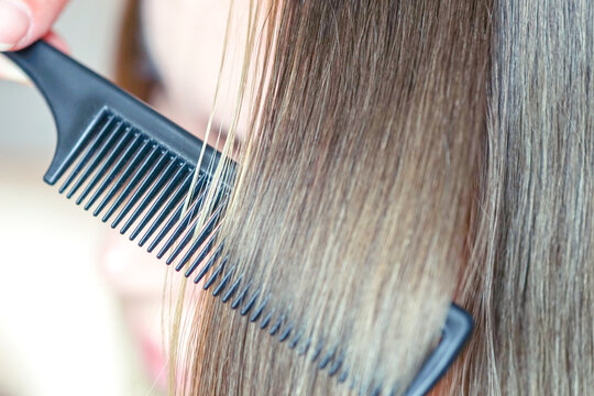 The process of combining a fine black comb for medium brown hair with a silver shine