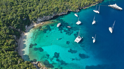 Aerial drone photo of iconic Sivota complex islands consisting of Mourtos island, Mourtemeno and Agios Nikolaos with turquoise clear sandy beaches and popular resorts, Thesprotia, Epirus, Greece