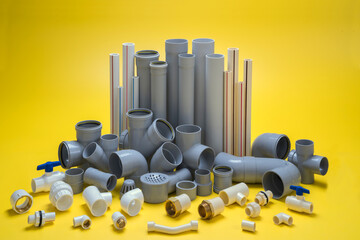 UPVC  CPVC Fittings for polypropylene pipes. Elements for pipelines. plastic piping elements. They are designed for connecting pipes. Concept sale of polypropylene fittings. - obrazy, fototapety, plakaty