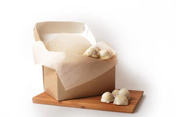 Dumpling is a broad class of dishes that consist of pieces of dough (made from a variety of starch...