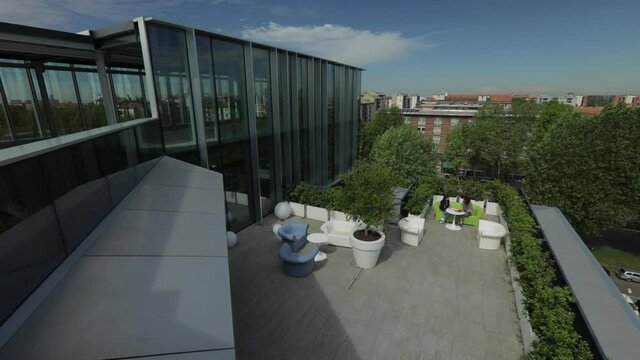 A moderne terrace with luxury and design furnitures. Sunny day on a stylish terrace. A beautiful terrace. 
