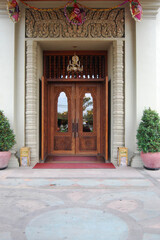 Antique retro modern classic vintage architecture door gate entrance and building of resort hotel for Cambodian people and foreign traveler rent and rest use service at SiemReap in Siem Reap, Cambodia