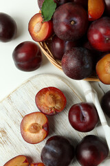 Concept of fruit with plums on a white background