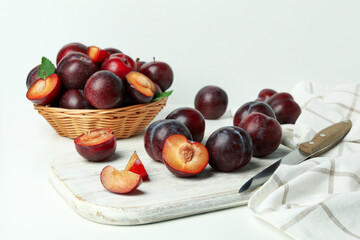 Concept of fruit with plums on white background