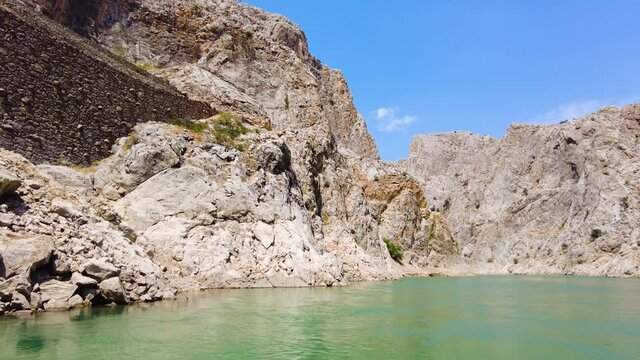 Huge steep cliffs, Magical canyon on the Euphrates River, Dramatic geological wonder. Beautiful background and unusual landscape, 4k gimbal shoot