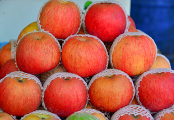 Selling apples at rural market in Myanmar