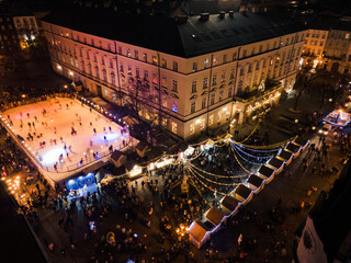 aerial view of christmas city center with crowd of people