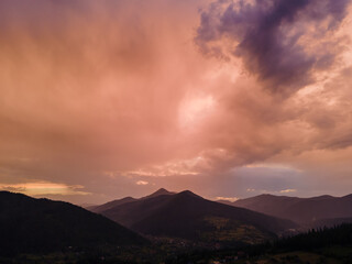 overcast sunset above mountains