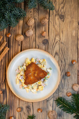 Traditional Christmas dinner in Czech Republic - carp fillet with potato salad