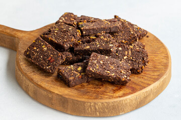 Hazelnut and pistachio cookies on white background