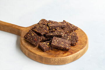 Hazelnut and pistachio cookies on white background
