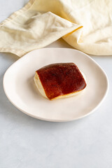 Fried milk dessert on a white background. Turkish dessert kazandibi