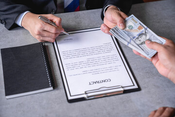businessman or corrupt politician and willing to accept bribes given in dollar cash To do illegal...