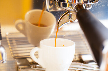 pouring coffee into a glass