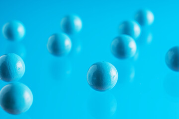 Blue balls on blue background. .Abstract background with bright balls