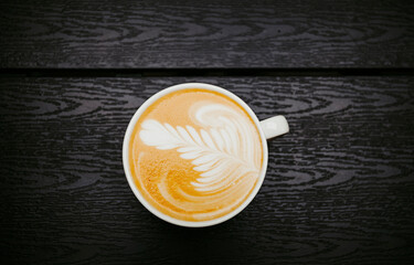 cup of coffee on a black background