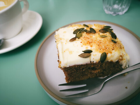 Parsnip Cake on a White Plate and Green Table