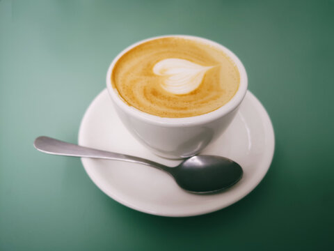 Coffee Cappuccino with green background