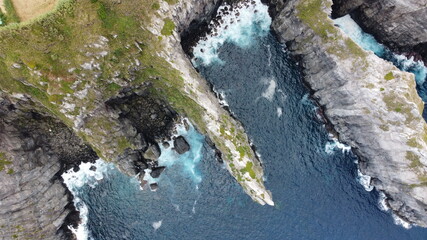aerial movie, rocky coast, cliffs seen from above, Atlantic Ocean, Azores islands, Sao Miguel