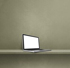 Laptop computer on green shelf. Square background