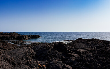 Fototapeta na wymiar View of the scenic lava rock cliff in the Linosa island.