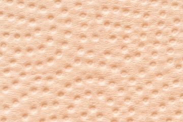 デコボコした薄橙色の背景画像